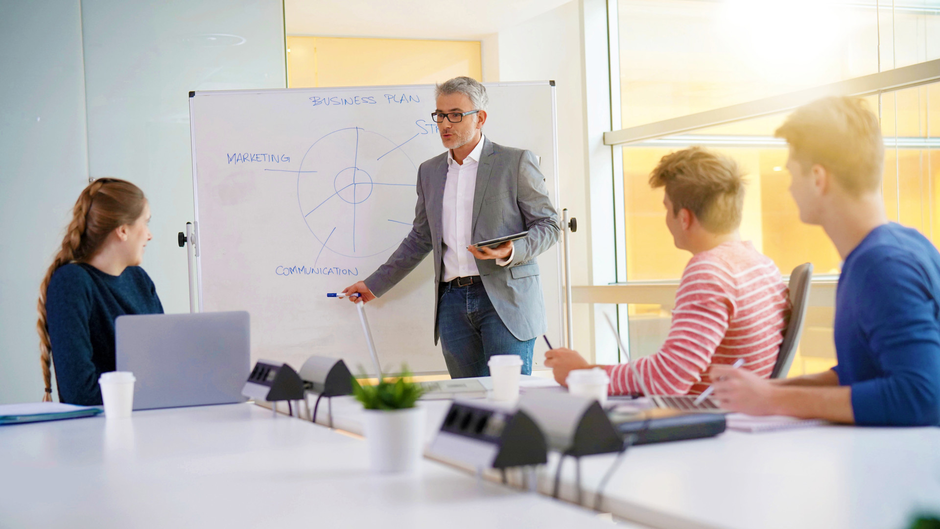 Man giving business presentation during meeting